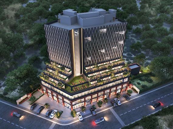 Shivalik Ognaj commercial building facade with shops and offices